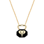 Necklace with black ceramic charm shaped like a lock with a gold elephant inlay