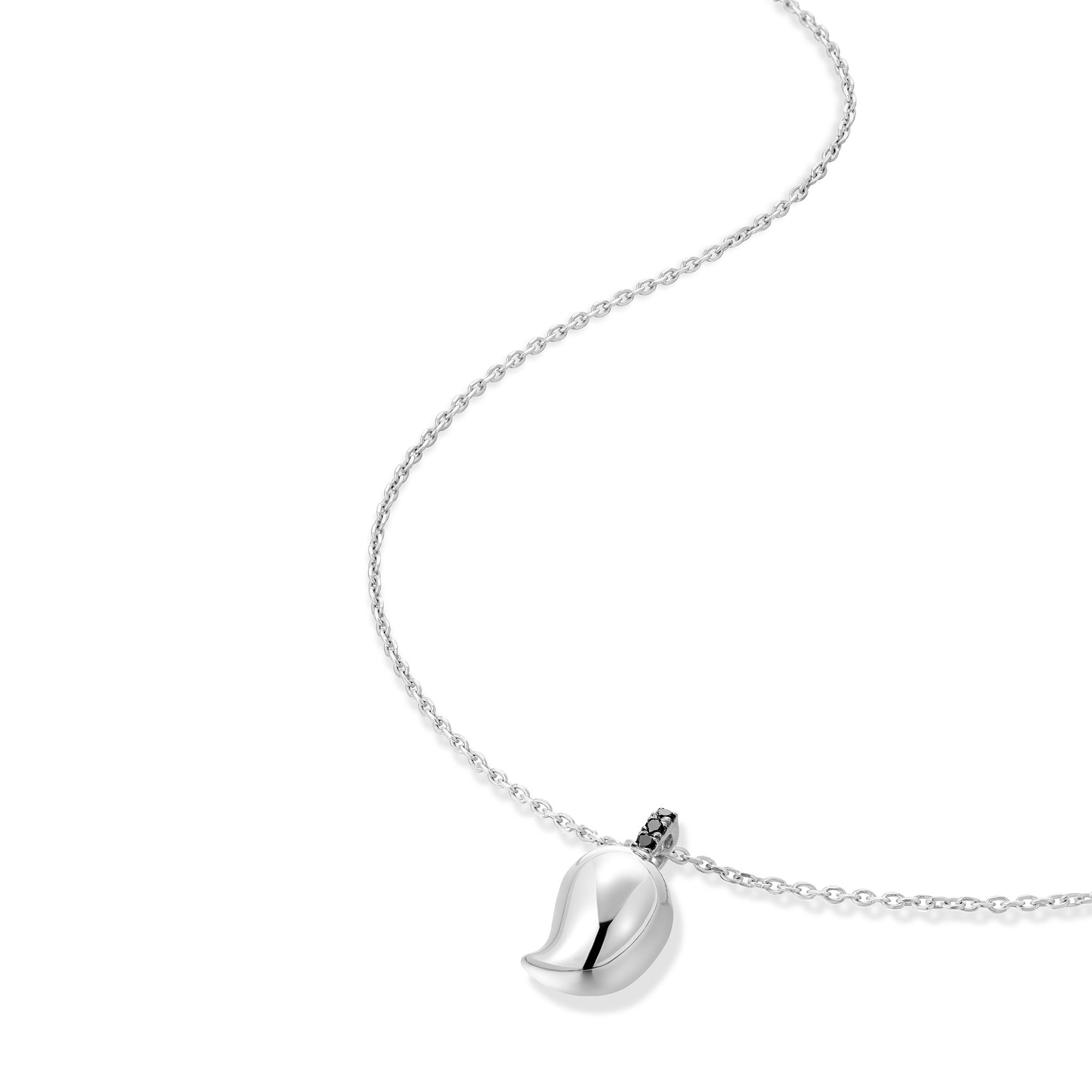 Silver mango pendant necklace shown at angle displaying curved chain and sculptural pendant placement