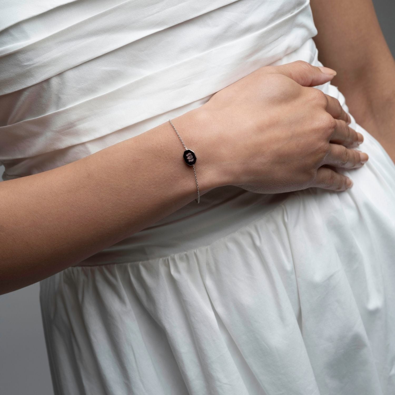 Inessa black ceramic bracelet minimalist styling, sterling silver rhodium finish solo wear