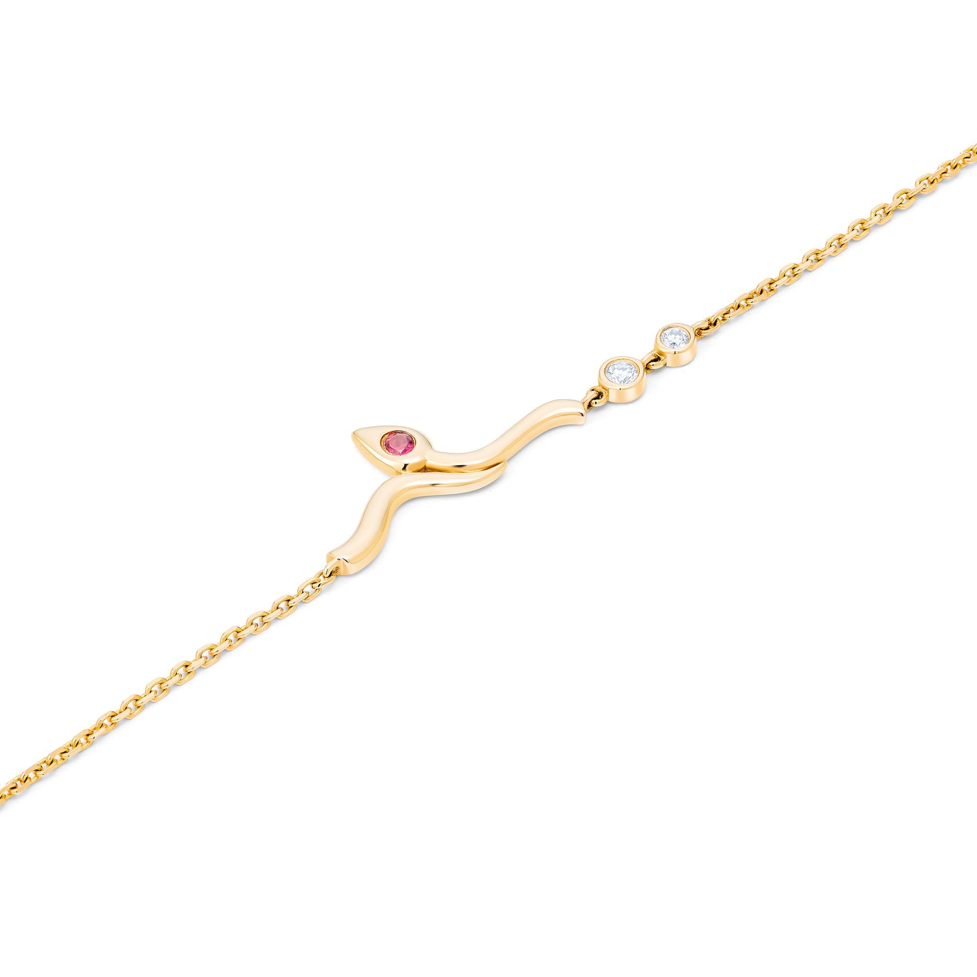 Close-up of lotus bud charm with pink tourmaline and diamond accents on adjustable gold bracelet