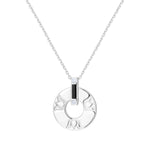 Silver lotus necklace with black ceramic details showing cut-out petal design and diamond accents