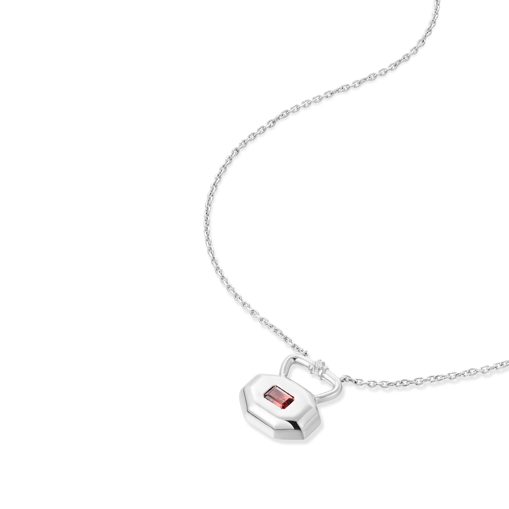 October pink tourmaline birthstone lock pendant shown at angle displaying natural movement and light reflection on silver chain