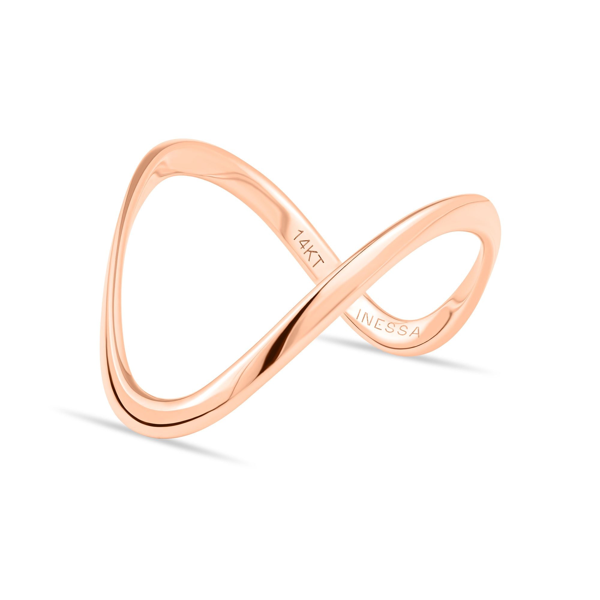 Inessa 14k rose gold sculptural wave ring side view, organic curves from Confidence Collection
