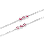 Close-up of bezel-set ruby clusters on recycled sterling silver chain, Inessa layering necklace