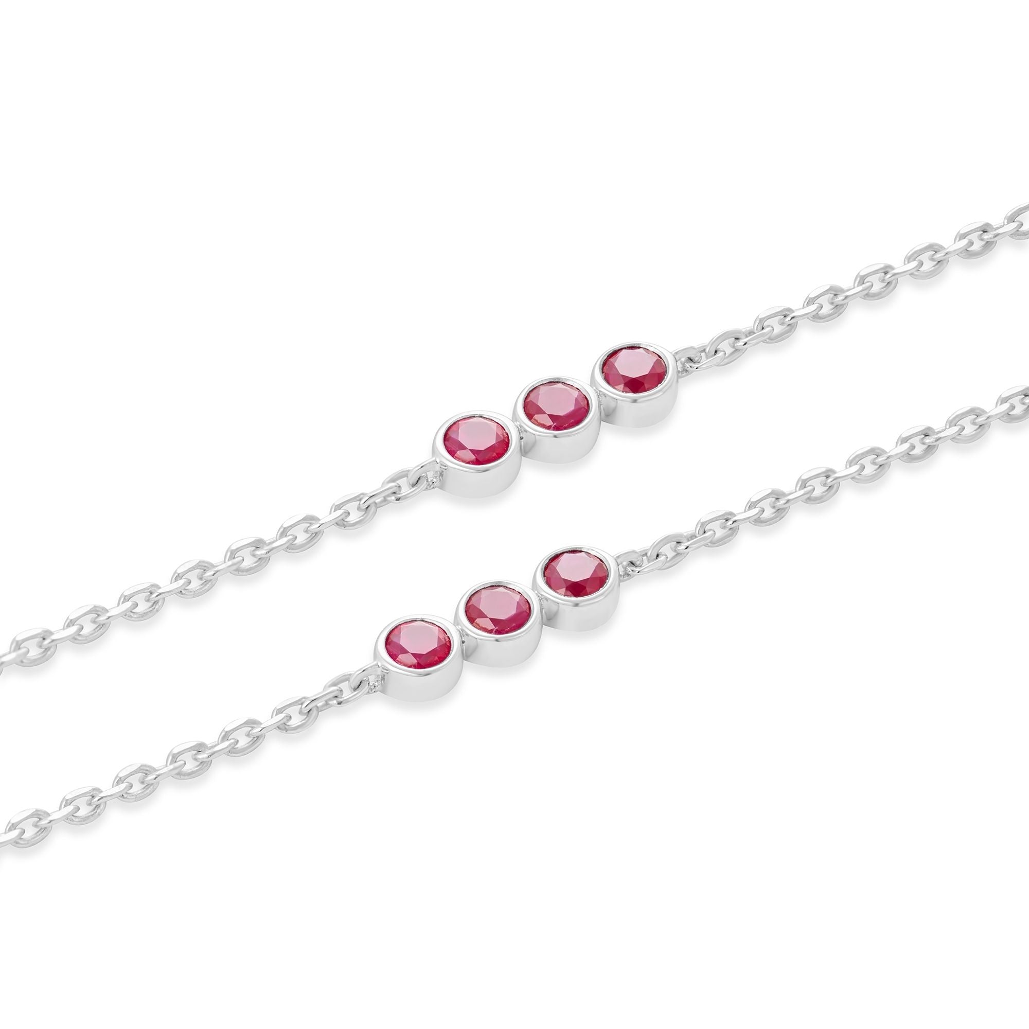 Close-up of bezel-set ruby clusters on recycled sterling silver chain, Inessa layering necklace