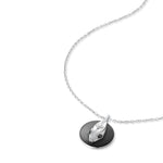 Inessa serpent coin pendant in sterling silver with black ceramic and diamond accents, Renewal Collection transformation jewelry