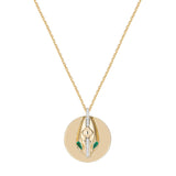 Inessa serpent coin pendant in 14k gold with emerald eyes and diamond spine, Renewal Collection transformation jewelry
