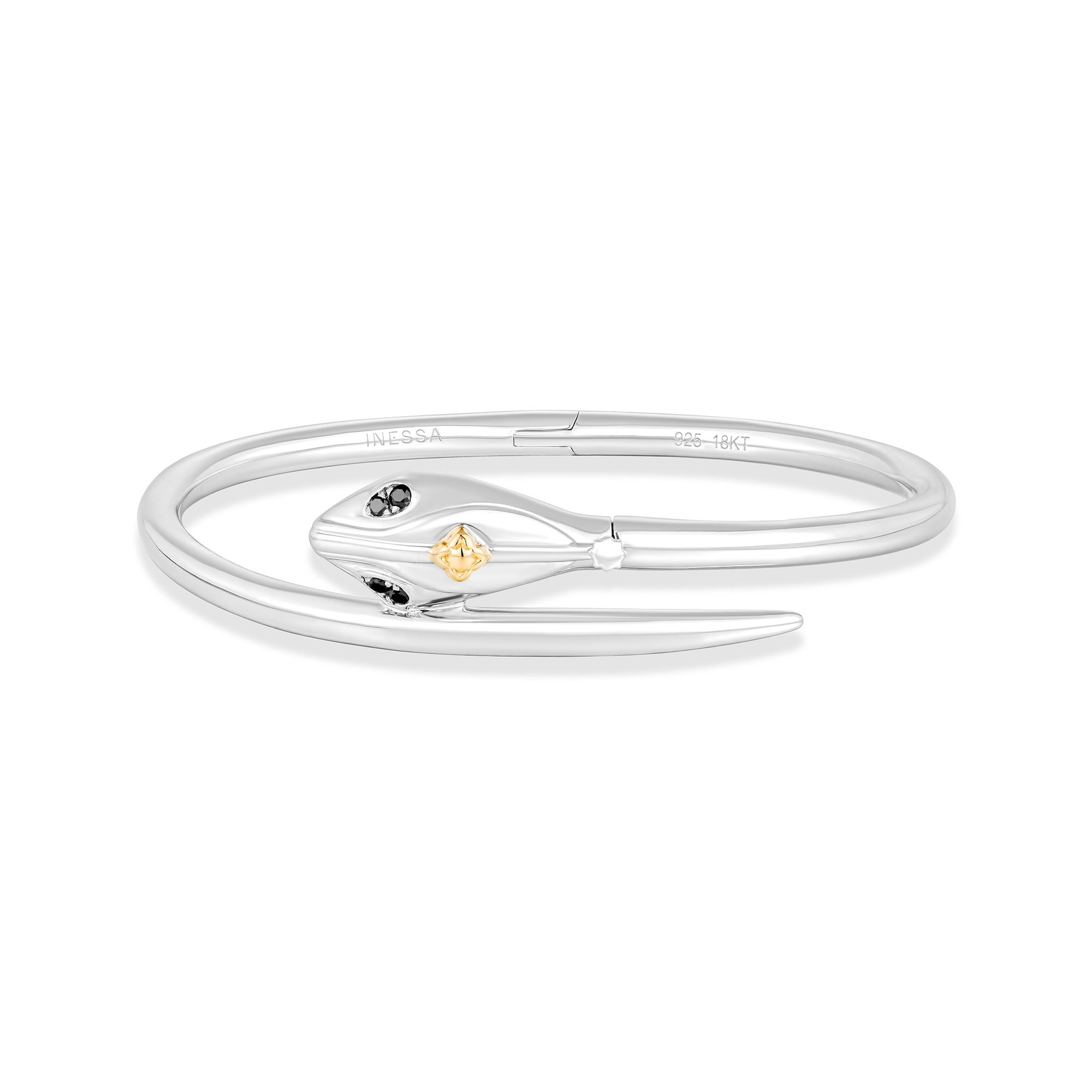 Top view of serpent hinged bangle showing secure hinge opening and sterling silver construction with gold details