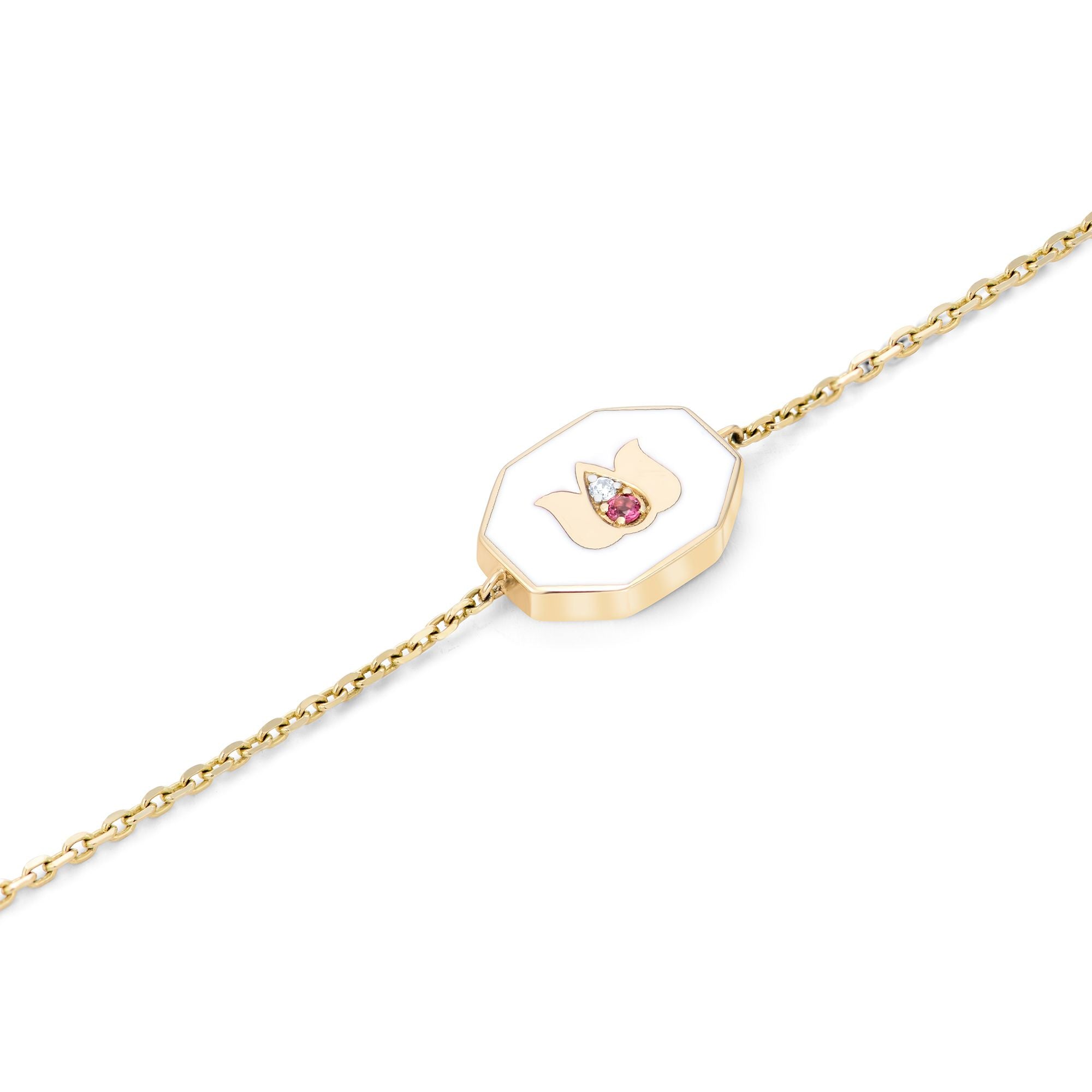 Inessa white ceramic lotus bracelet with pink tourmaline in 14k gold from Strength Collection